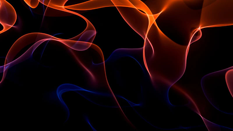 Orange smoke wisps swirling on dark background